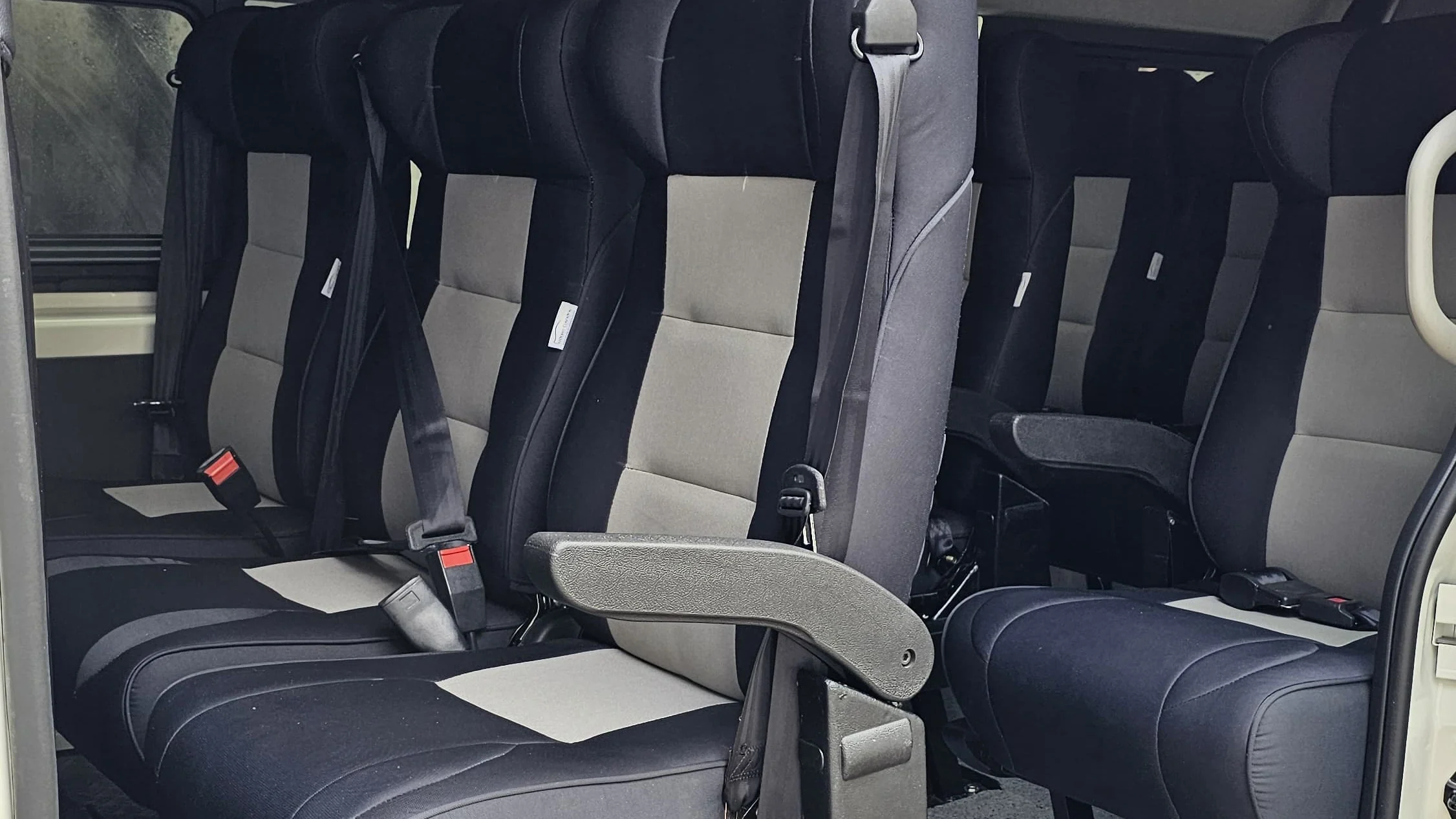 Finished van interior with full rows of seats